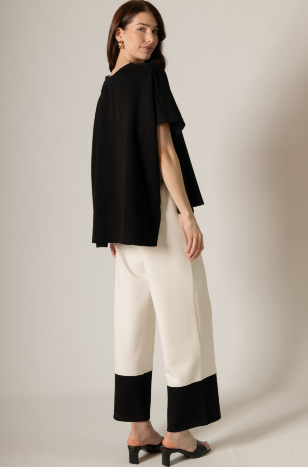 Butter Modal Side Slit Cape Top in black: Available sizes - S, M, L.