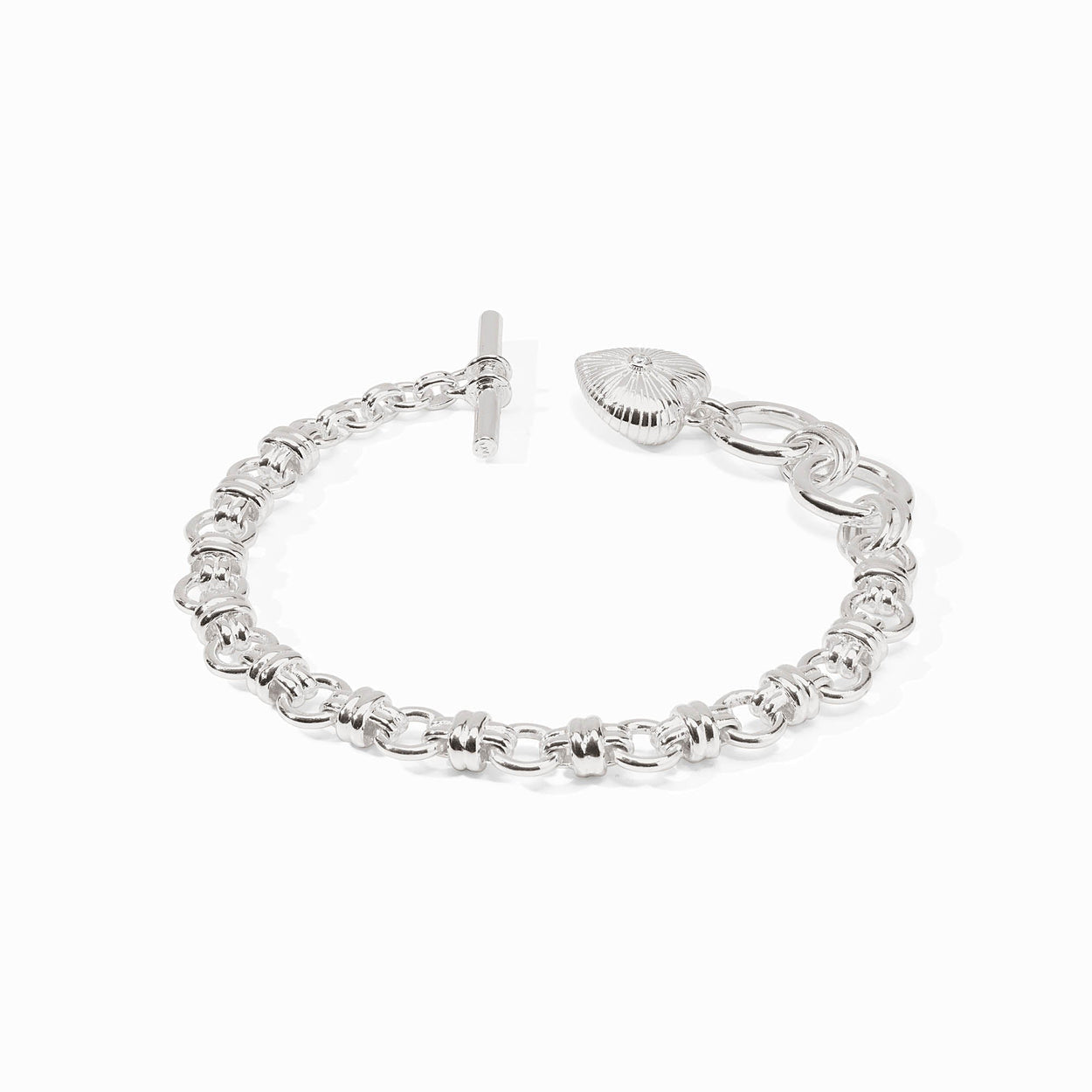 Silver bracelet with interlocking circular links, toggle clasp, and textured heart-shaped cubic zirconia charm. Sizes: S, M, L.