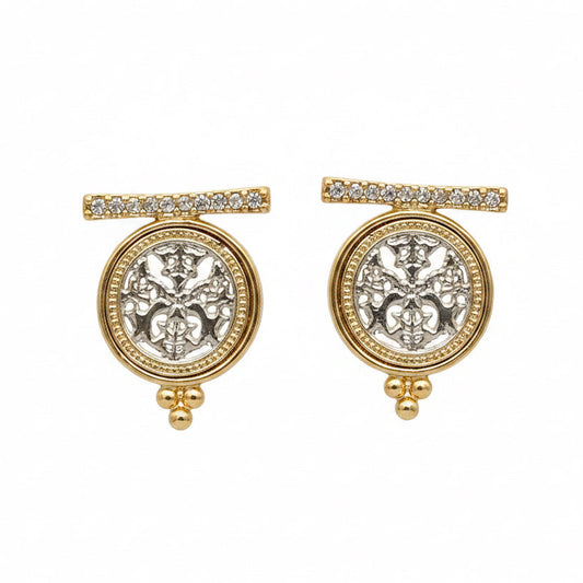Gold and silver post earrings featuring a round filigree medallion, gold bead accents, and a horizontal bar with clear stones. Available in multiple sizes.