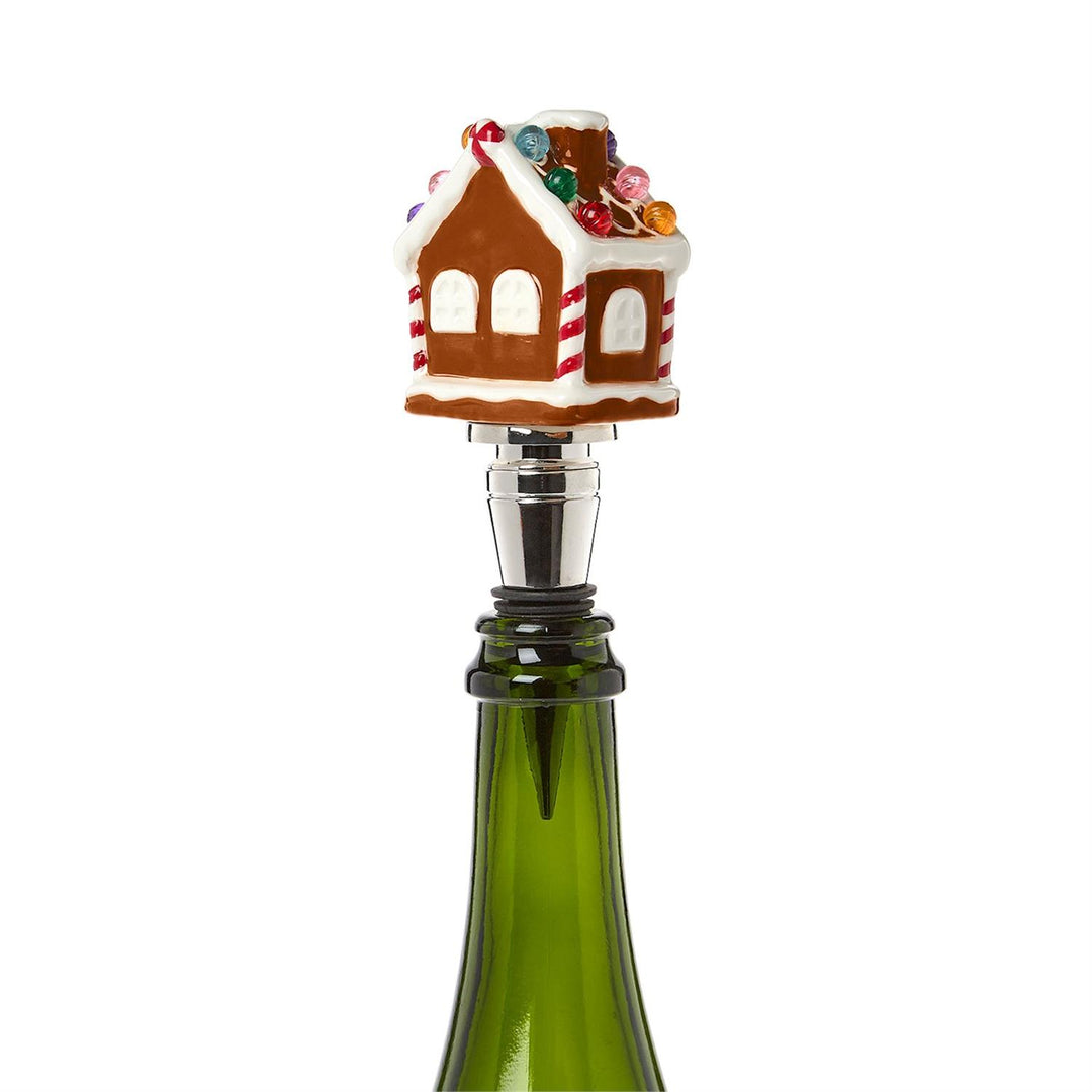 LED gingerbread house bottle stopper with colorful lights.