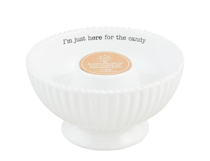 White dolomite pedestal candy dish, ribbed sides, text on rim, round center label. Size: 3.5" x 6.75".