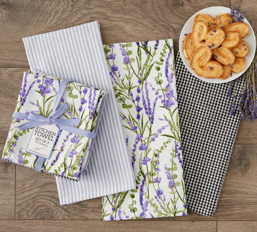 Set of 3 kitchen towels: striped, black-and-white checked, and lavender floral. Available in standard and large sizes.