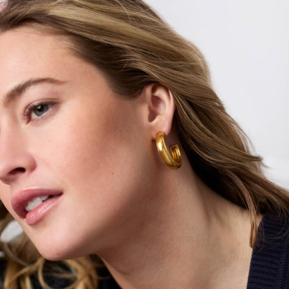 Cannes Hoop Gold Earrings, available in small and medium sizes, shown in detail with a subtle gold finish.