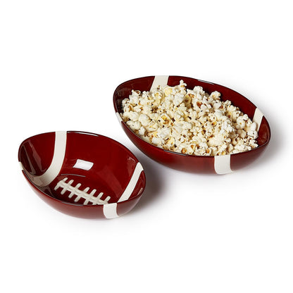Set of two ceramic tidbit bowls shaped like footballs. Available in small and medium sizes.