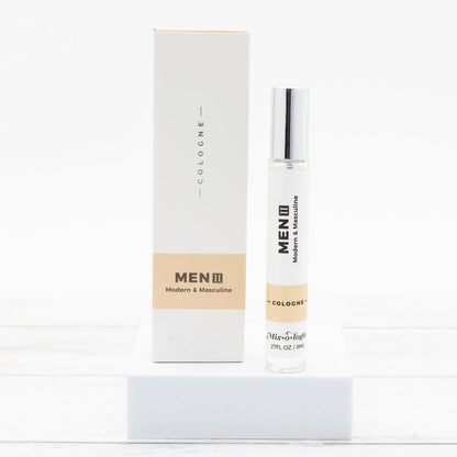 8ml cologne spray in clear glass bottle with minimalist black text; long-lasting fragrance.