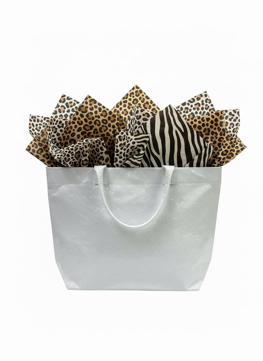 Vintage Tote Bag filled with leopard and zebra print tissue paper. Available in small, medium, and large sizes.