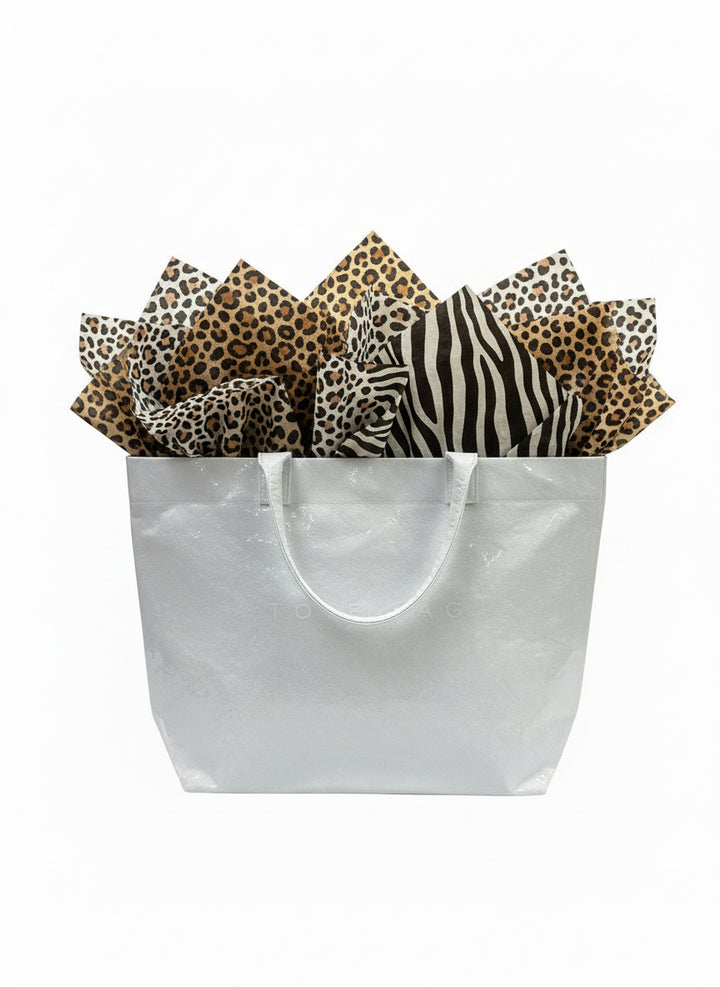 Vintage Tote Bag filled with leopard and zebra print tissue paper. Available in small, medium, and large sizes.