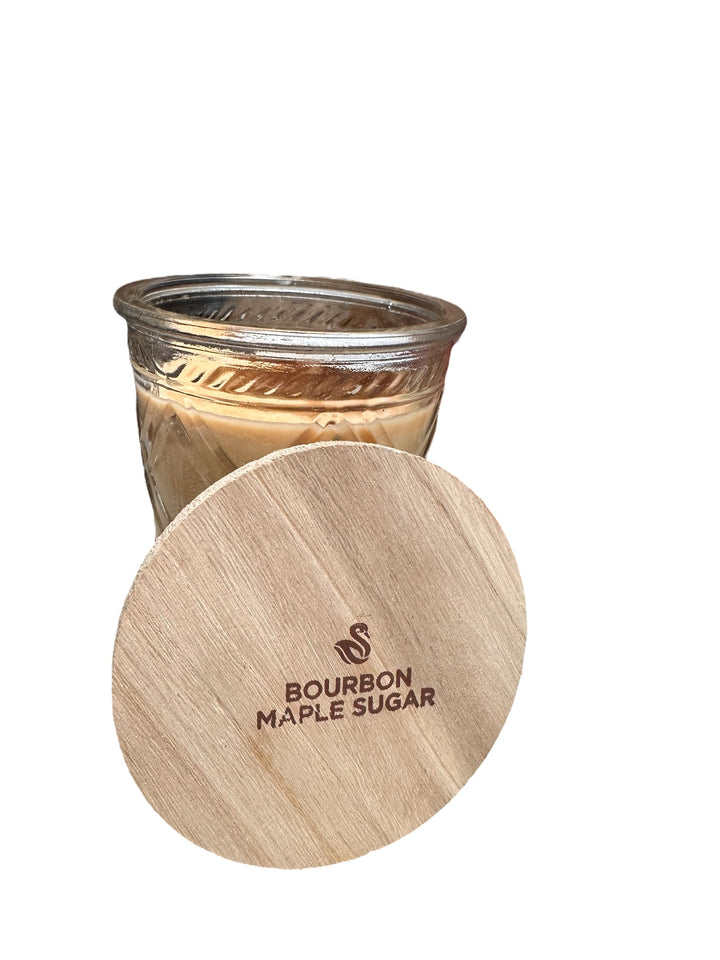 12oz beige soybean wax candle labeled "Bourbon Maple Sugar" in glass jar with wooden lid. Only available in 12oz size.