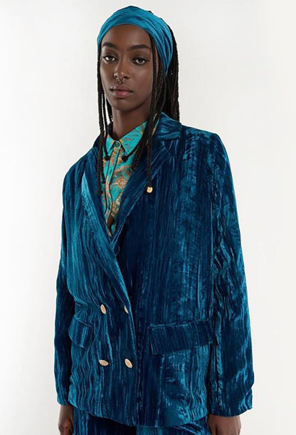Kim Crushed Blue Velvet Jacket with gold buttons. Available in sizes XS–XL.
