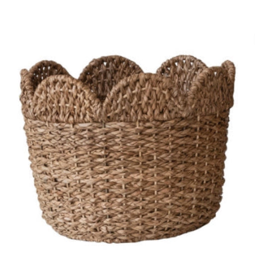 Braided Bankuan and rattan scalloped baskets with a woven texture.