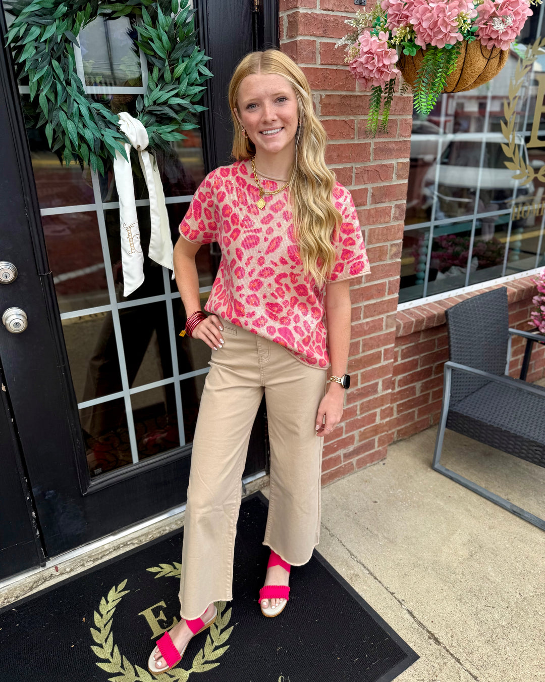 Pink Sequin Covered Leopard Top; available in sizes XS–XL.