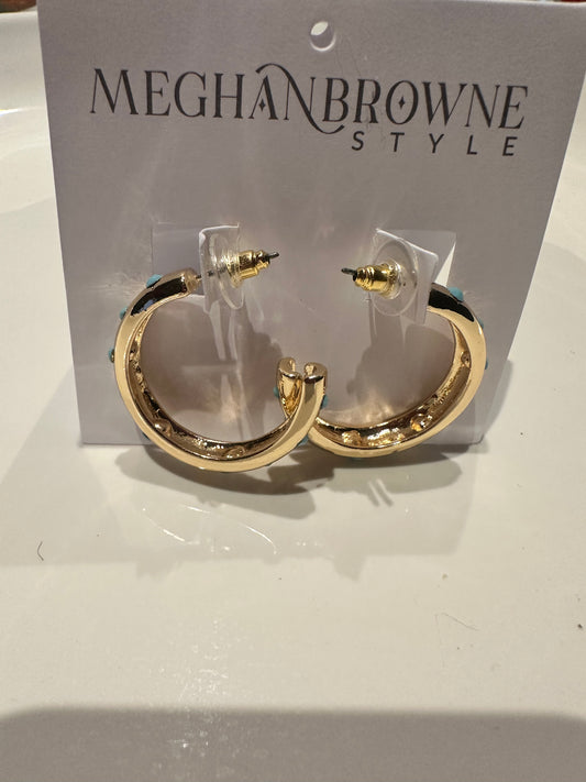 Small, shiny gold Romy Hoop Earrings with a thick, irregular design and clear backings. Sizes available: small.