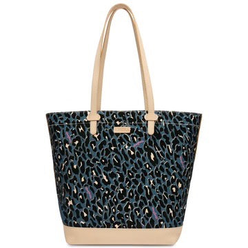 The Danni Daily Tote is a stylish leather bag with a spacious interior, featuring beige handles and bottom. It has a leopard print pattern in dark blue and black, accented with purple and tan. Available size: One Size.