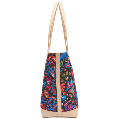 Sam Daily Tote, spacious with beige handles and base, multicolored floral quilted fabric. Available in small and large sizes.