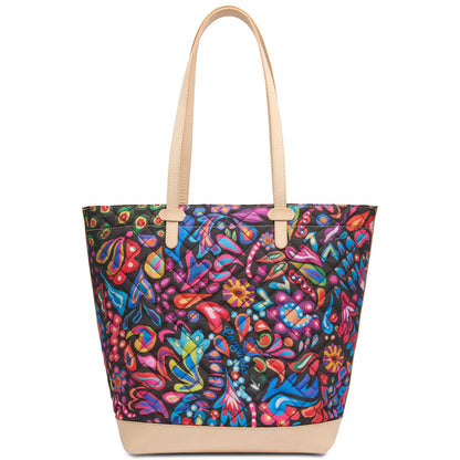 Sam Daily Tote: spacious leather bag, beige handles/base, quilted floral fabric in red, blue, purple, yellow; sizes available.