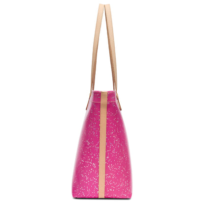 The Daily Tote, Berry is a pink leather handbag with white speckles, a tan center stripe, tan shoulder straps, zippered closure, and spacious interior. Sizes available: Small, Medium, Large.