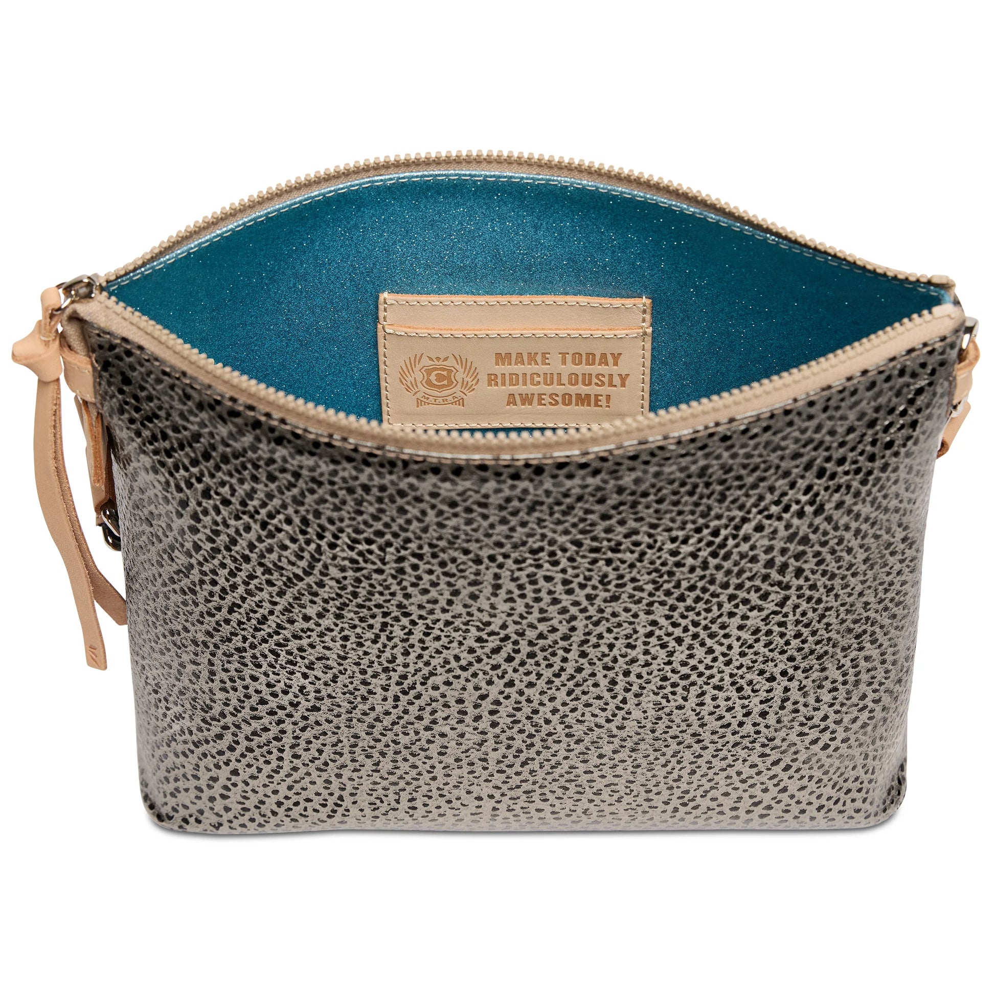 Textured metallic gray zippered crossbody pouch with teal interior, gold-lettered patch, and adjustable strap. Available sizes: Small, Medium, Large.