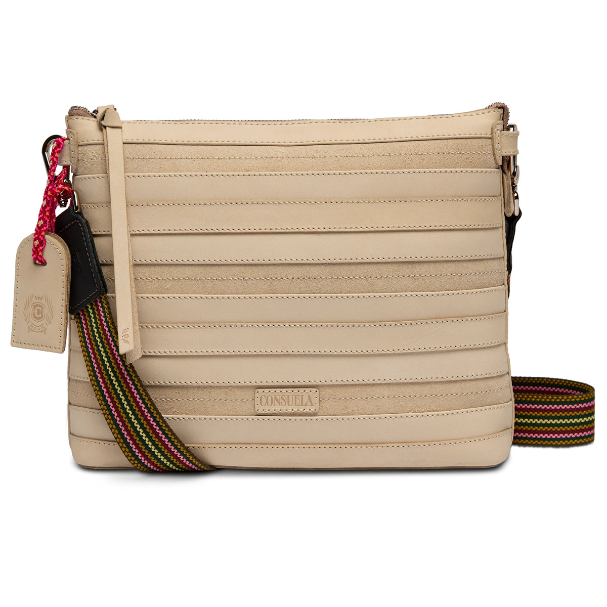 Beige Diego leather crossbody bag with horizontal stitching, rainbow-striped adjustable strap, red braided keychain, and Consuela brand embossed on front. Available in one size.