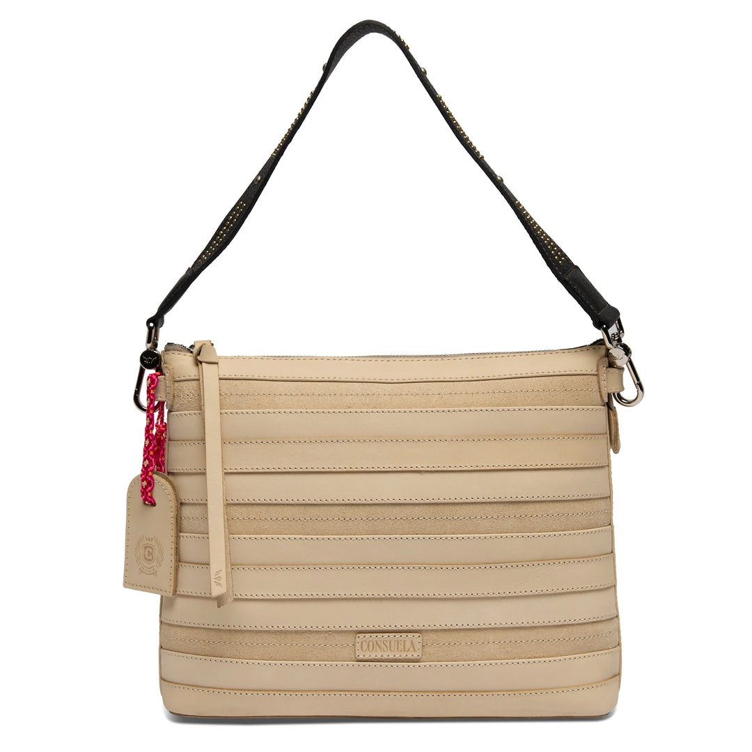 Beige leather crossbody bag with horizontal stitching, black adjustable strap, beige tag, and red chain detail. Rectangular shape and minimalist design. Available in small, medium, and large sizes.