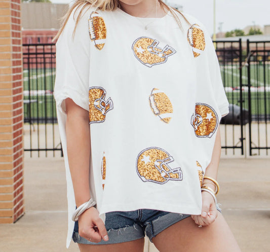 Loose white Sequin Football Game Day Shirt with sequined football helmet designs. Sizes: Small, Medium, Large, Extra Large.