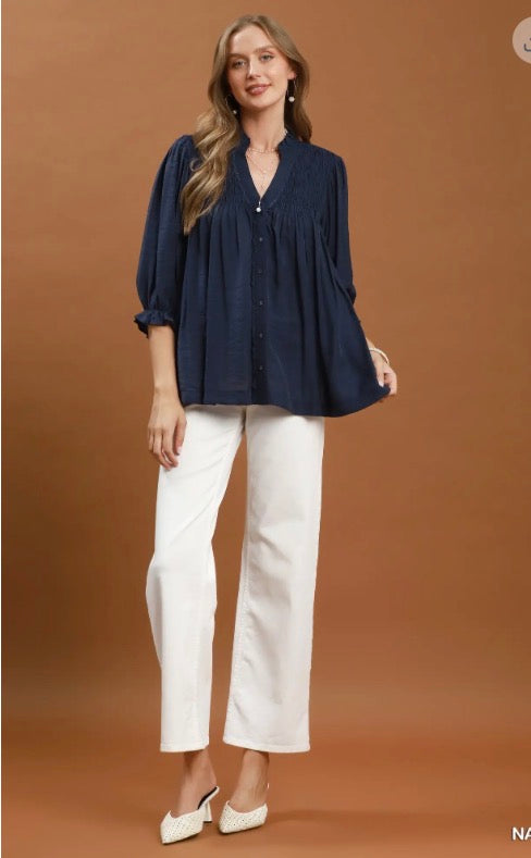 Navy Smocked Yoke Button Front Blouse with three-quarter sleeves. Available in sizes XS–XXL.
