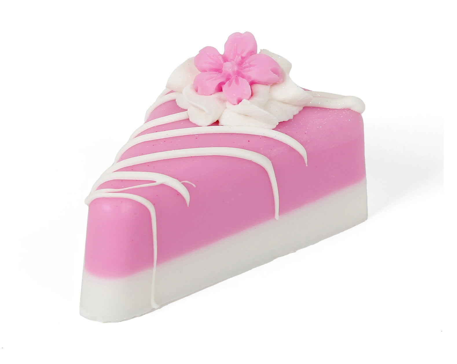 Pink and white cake slice soap with white icing drizzle, frosting, and pink flowers. Available in 2 oz, 4 oz, and 6 oz sizes.