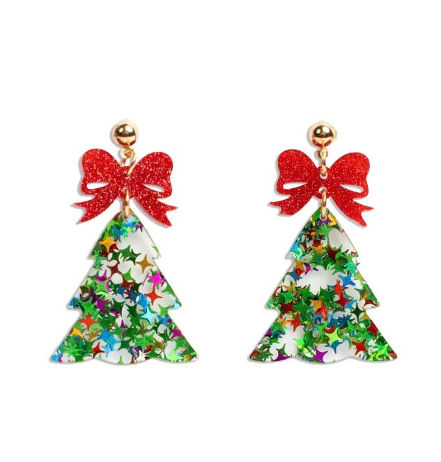 Twinkle Tree drop earrings shaped like Christmas trees with colorful star glitter and red glitter bows. Available in one size.
