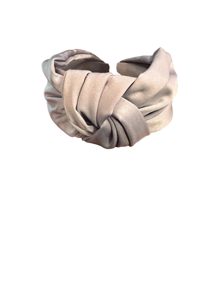 Silk Headband with twisted knot front, padded pale pink satin. Available in sizes S, M, L.