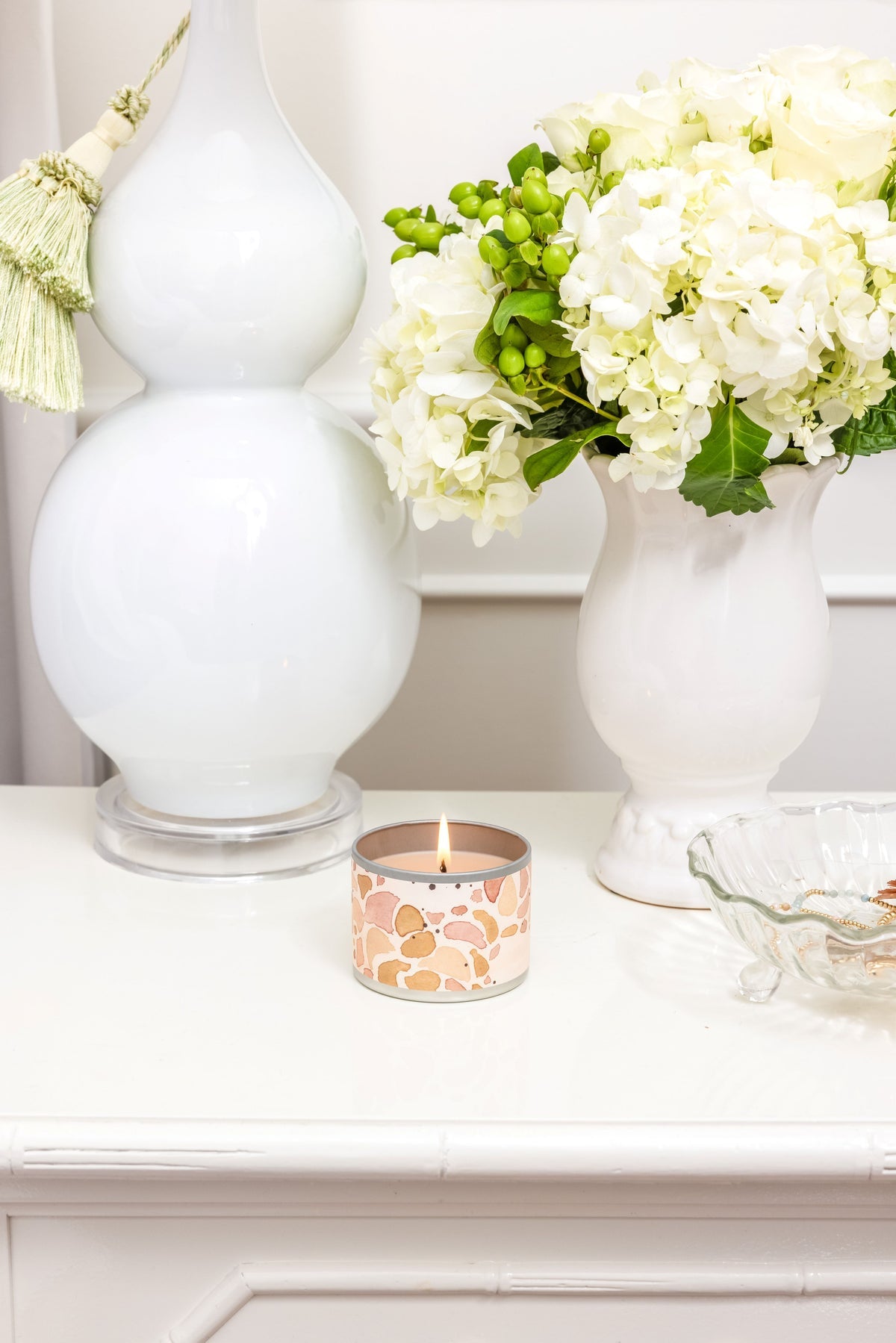 Cashmere Kiss Tin Candle, lit, 4 oz. size. Also available in multiple sizes.