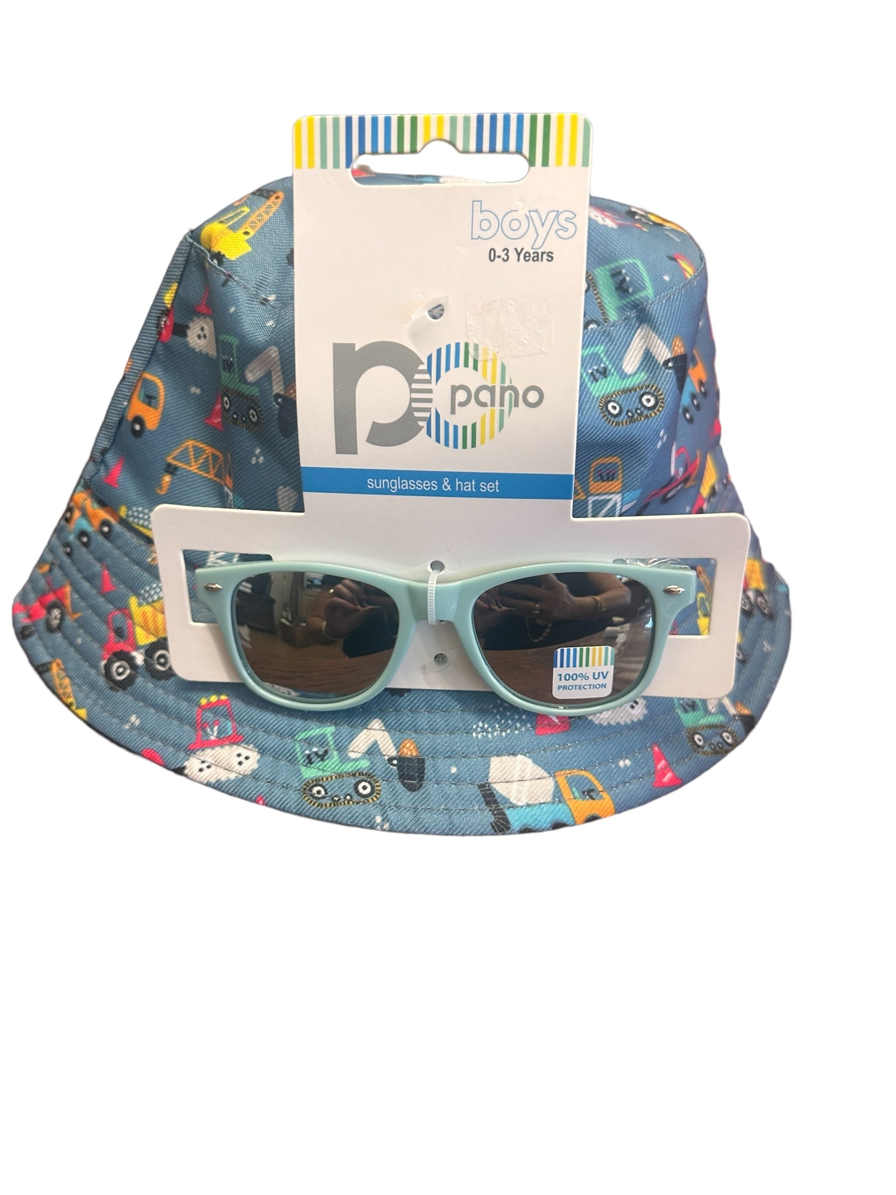 A stylish blue bucket hat with a colorful vehicle print for boys aged 0-3 years. Comes with light blue sunglasses featuring UV400 protection. Available sizes: Small, Medium, Large.

