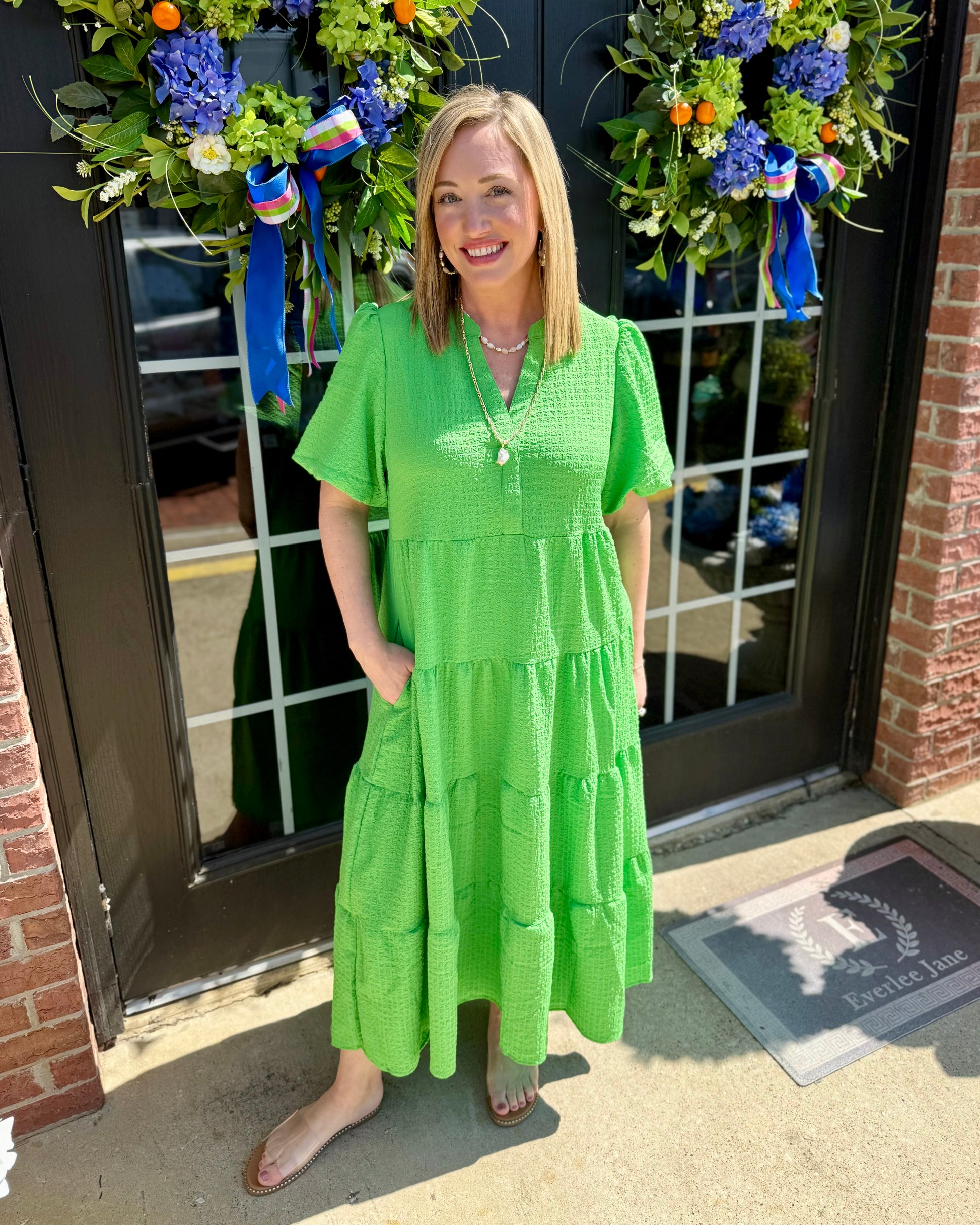 Kinsley Green Seersucker Dress; features pockets. Available in sizes XS–XL.