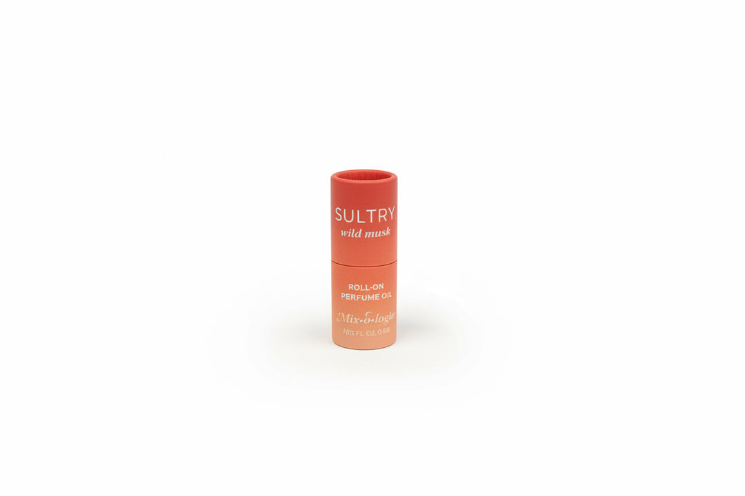 Coral cylindrical "Keychain Mini Rollerball Perfume," alcohol-free, gentle, available in mini size.