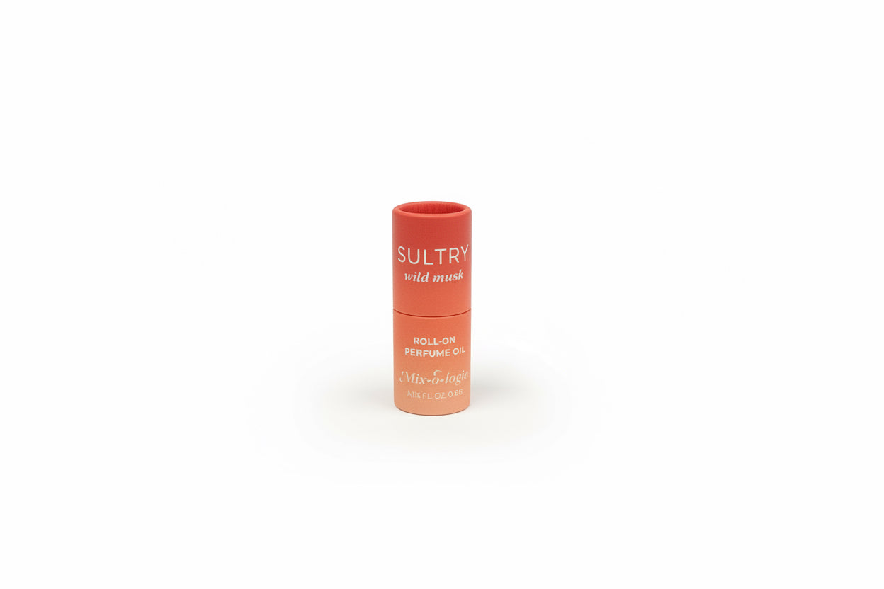 Coral cylindrical "Keychain Mini Rollerball Perfume," alcohol-free, gentle, available in mini size.