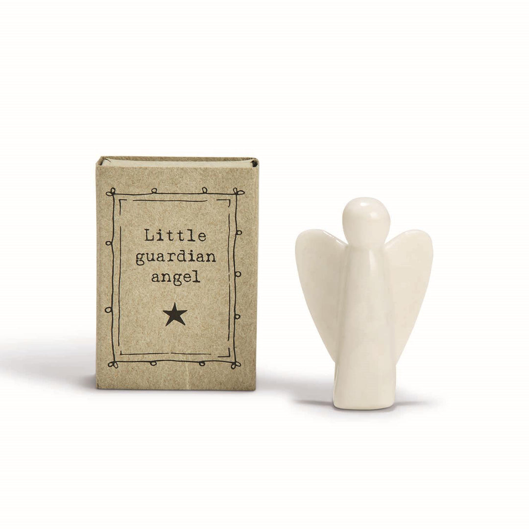 Small, cream-colored East of India ceramic angel figurine.