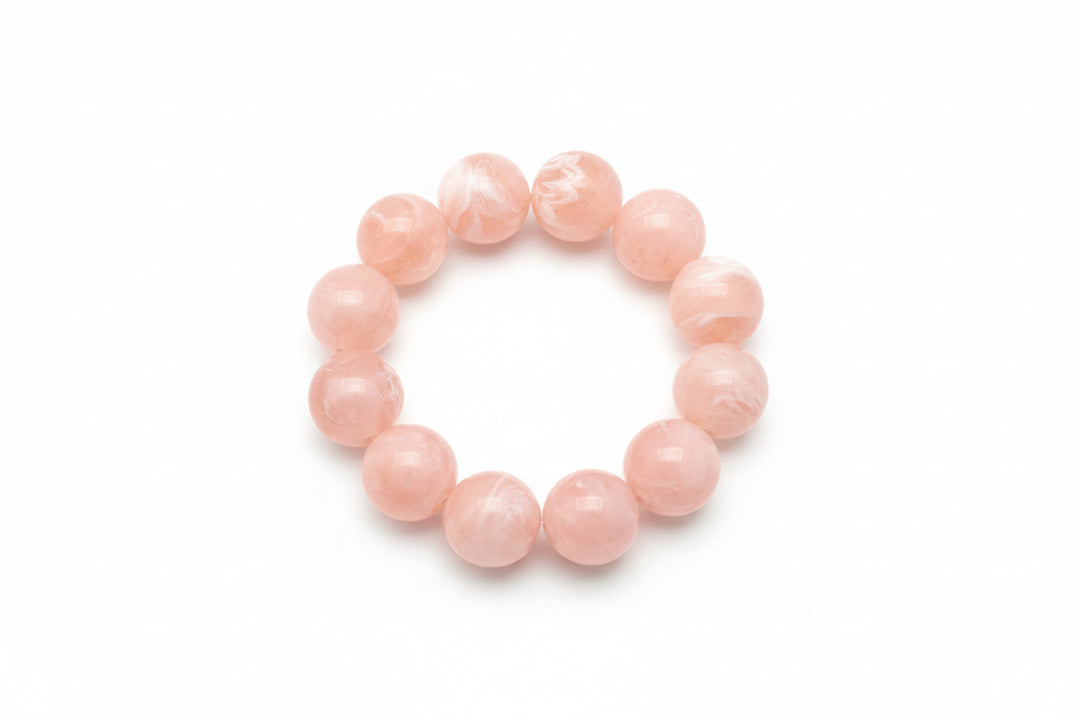 Large Ball Stretch Bracelet with smooth, light pink beads. Available sizes: small, medium, large.