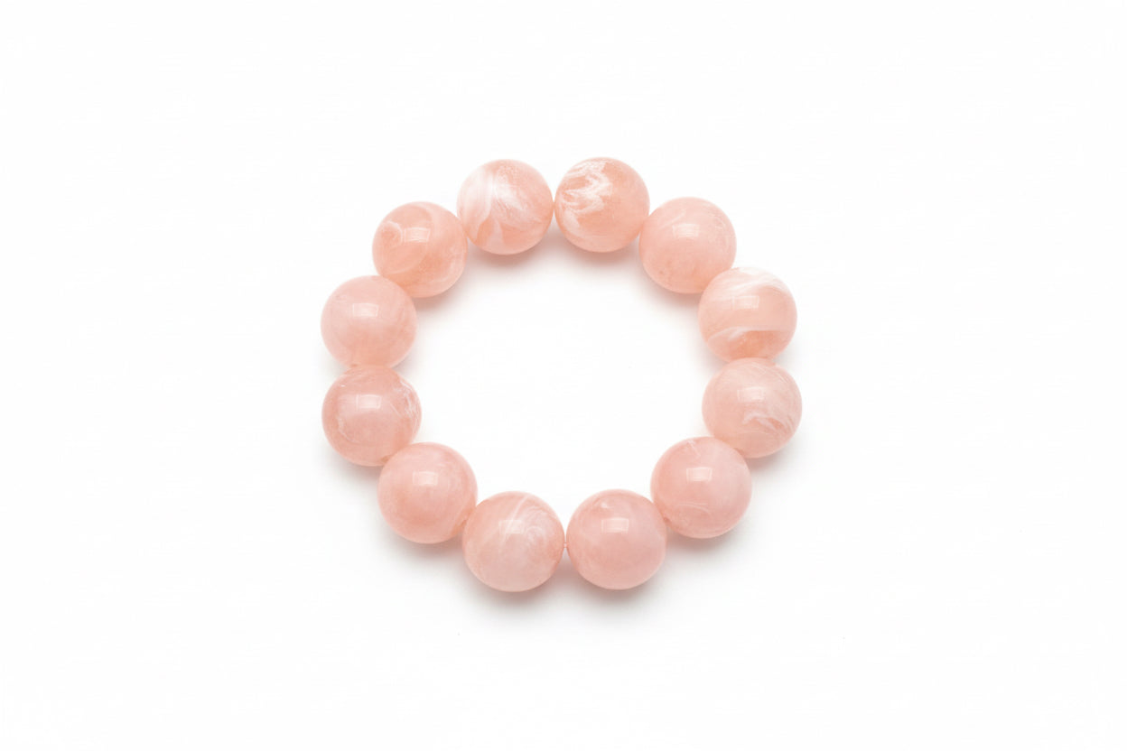 Large Ball Stretch Bracelet with smooth, light pink beads. Available sizes: small, medium, large.