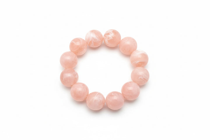 Large Ball Stretch Bracelet with smooth, light pink beads. Available sizes: small, medium, large.