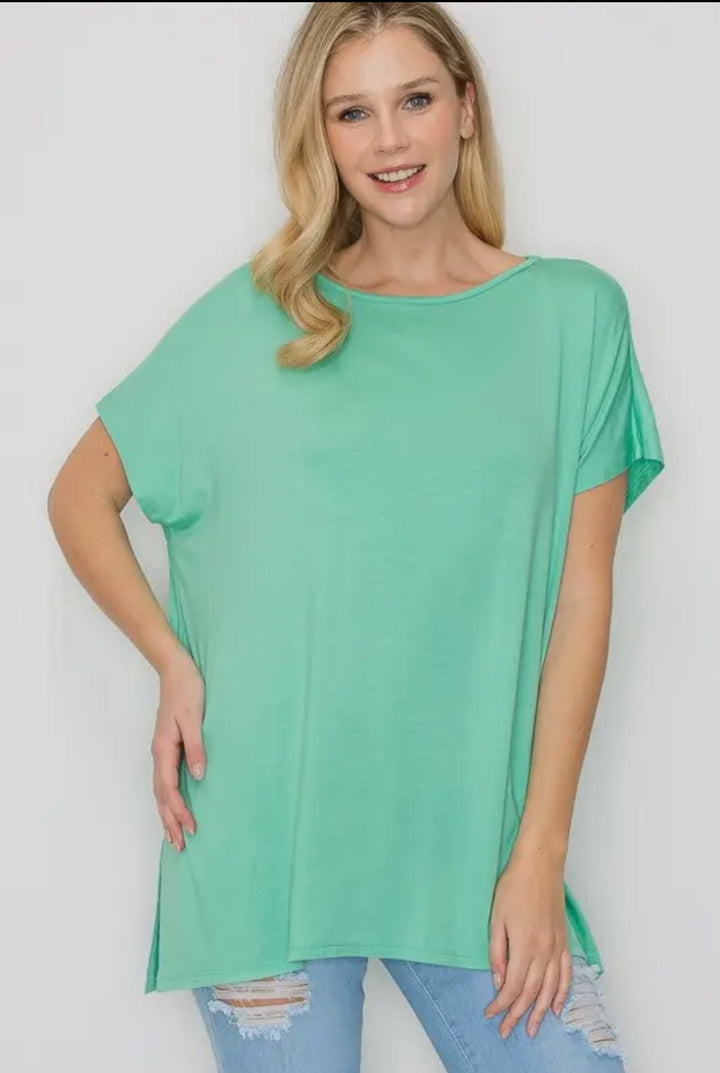 The Perfect Shirt: loose-fitting mint green rayon blend top, available in XS–XL, designed for a comfortable fit.