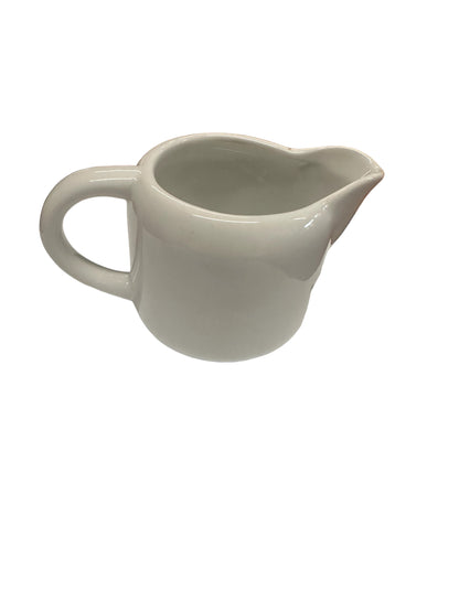 Small white stoneware pitcher with handle and spout. Available in 8oz, 12oz, and 16oz sizes.