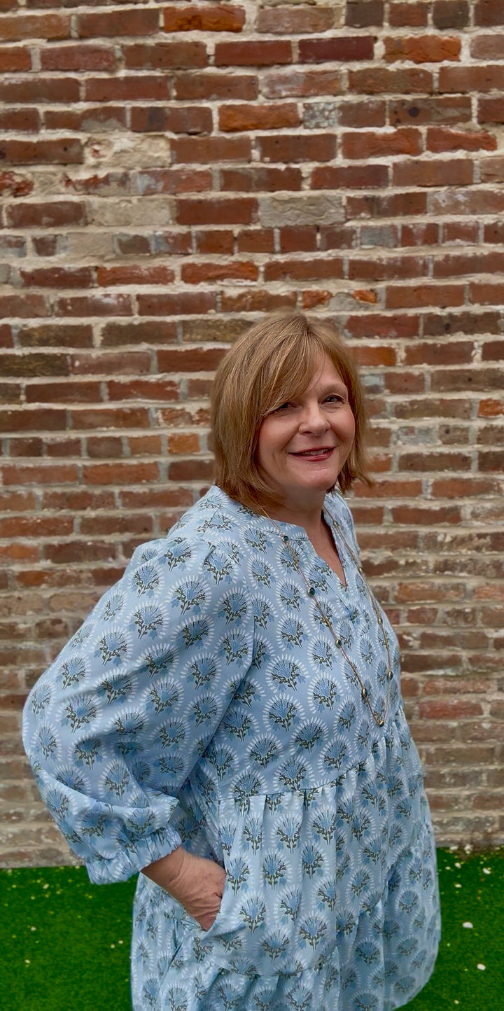 Cooper Botanical Blooms Dress: light blue, patterned, V-neck. Available in XS–XL.