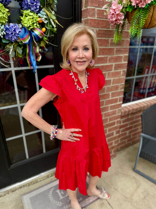 Sierra Red Dress with flutter sleeves; available in sizes XS–XL.