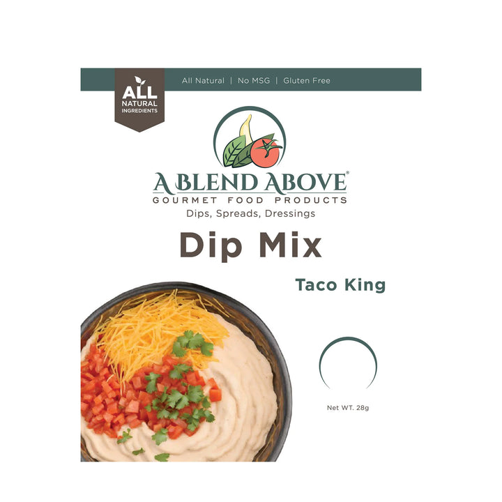 A Blend Above Dip Mix package, labeled all natural, gluten-free, and MSG-free; image shows creamy dip with shredded cheese, tomatoes, chives, and green onions. Sizes available: unspecified.