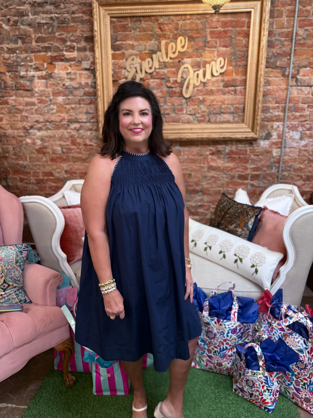 Navy Halter Neck A-line Dress, available in sizes XS-XL. Features sleeveless design and flared skirt.