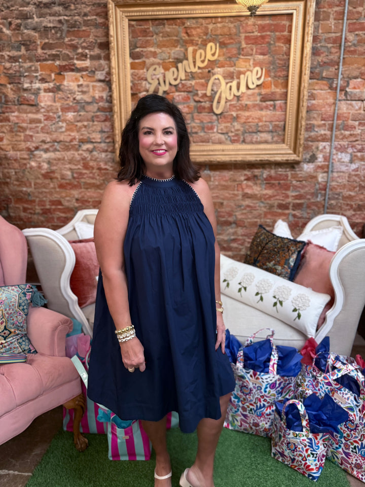 Navy Halter Neck A-line Dress, available in sizes XS-XL. Features sleeveless design and flared skirt.