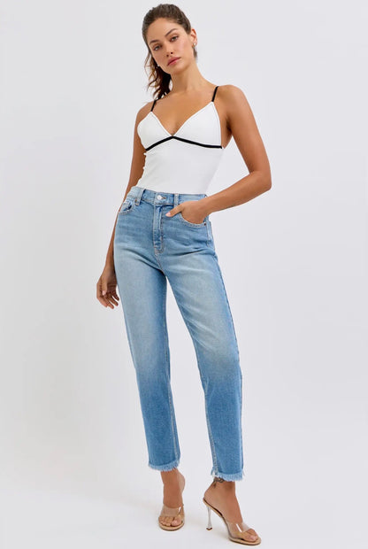 Distressed High Rise Mom Jeans, available in sizes 24-32. Features classic fit, light distressing, and cropped length.
