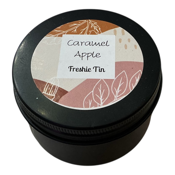 Small black Freshie Tin with autumn leaf design lid; labeled “Freshie Tin.” Available in small, medium, and large sizes.