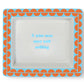 White porcelain desk tray, orange and blue border, "A wise man once said nothing" in blue. Size: 6"x4".