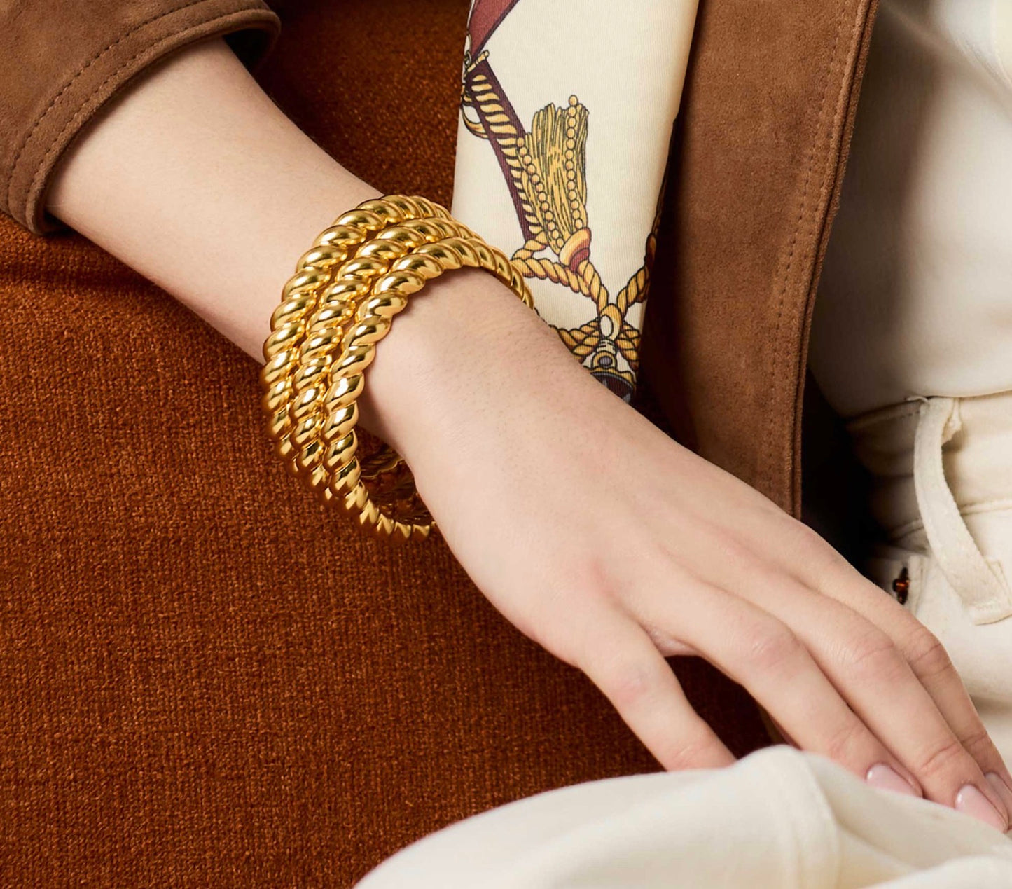 Ravello Bangle by Julie Vos: thick gold-plated bracelet, available in small, medium, and large.