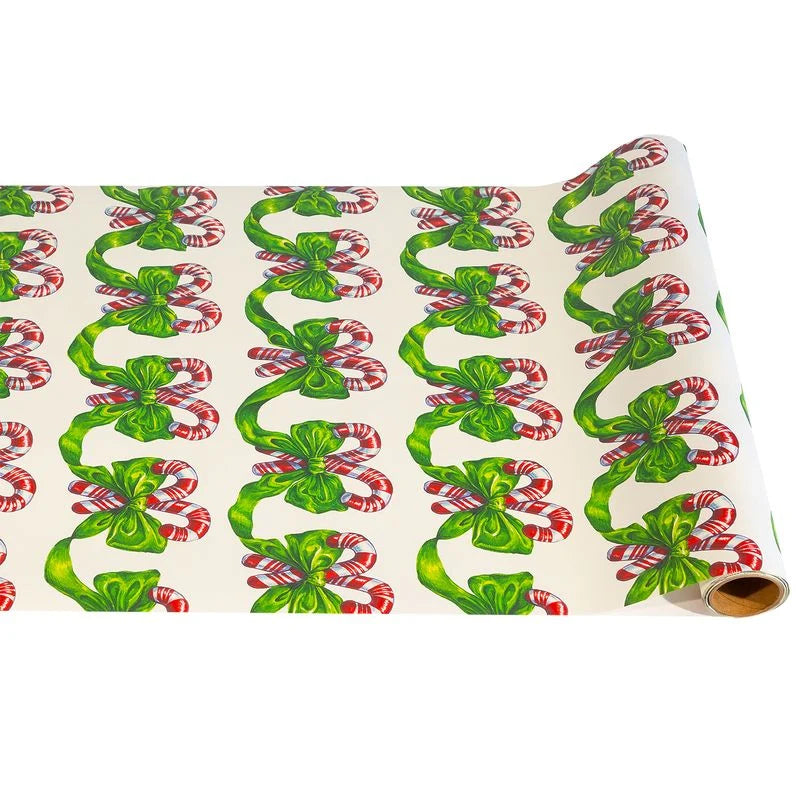 Festive Candy Canes Table Runner with candy cane and green bow pattern. Available in multiple sizes.