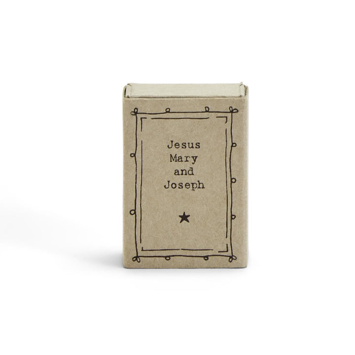 Small East of India Christmas matchbox with a hand-drawn border, “Jesus Mary and Joseph” text, and a star.